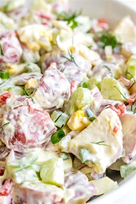 Pour the sour cream mixture over the potato salad and toss all of the ingredients together gently until they are well coated. Sour Cream Potato Salad - Home. Made. Interest.