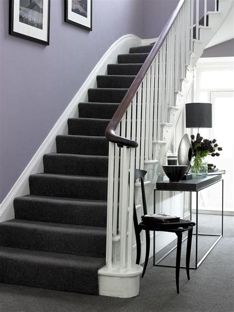 Awesome and appealing esthetics make the. Purple walls, white trim, dark brown/black furniture and ...