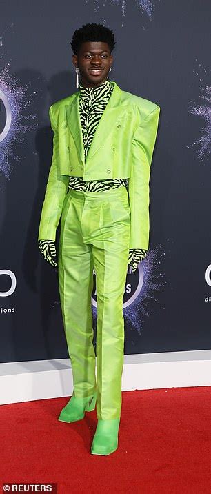 Although the shoes — which were created by lil nas x and the company mschf — are nikes, nike themselves told snopes that they have nothing to do with the creation or sale of the satan shoes. Lil Nas X shows off fashion sense in a lime green tuxedo and zebra-print top at the AMAs | Daily ...