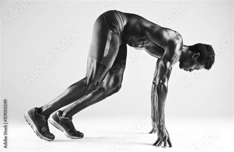 Sprinter African Man In Starting Position Stock Photo Adobe Stock