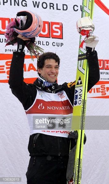 Andreas Kofler Of Austria Poses For Photographs On The Podium After Winning The Day Two Of The