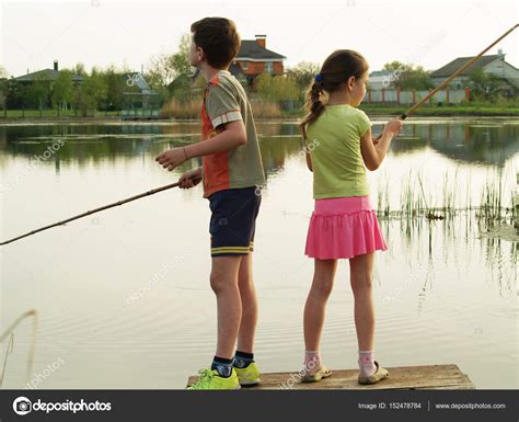 Children Fishing On The River — Stock Photo © Maxim1717 152478784