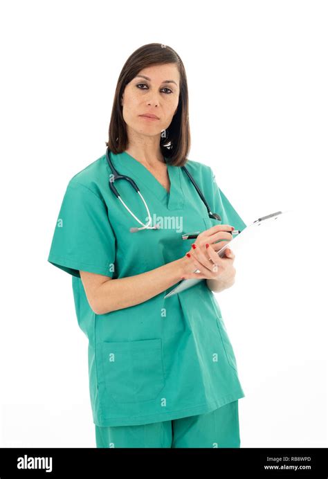 Portrait Of Serious Professional Female Doctor With Clipboard And