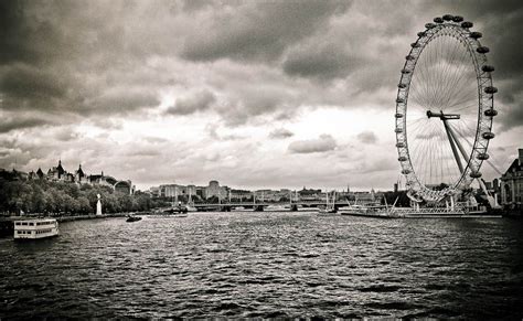 The London Eye Is A Giant Ferris Wheel Situated On The Banks Of The