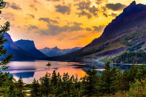 Wild Goose Island Sits On The Calm Waters Of Saint Mary Lake In Glacier