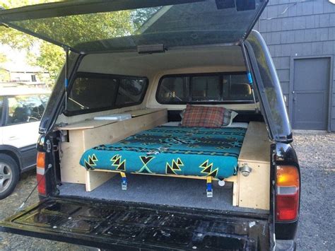 Without secure storage, your accessories are going to be sliding around the bed. Truck bed camping, Truck bed camper, Pickup trucks camping