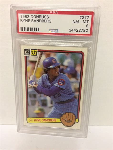 One of the key rookie cards from the 1983 donruss baseball set, the card design features a bat and glove at the bottom of the card where the player name, position and team information resides. 1983 RYNE SANDBERG #277 DONRUSS BASEBALL TRADING CARD (NM-MT 8)