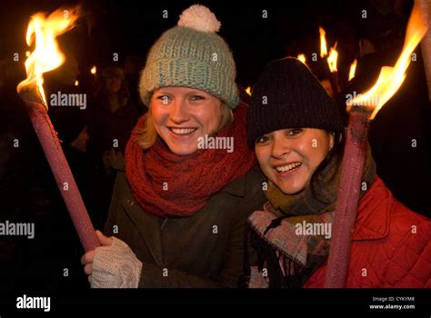 Two Young Women With Lighted Torches On Bonfire Night Chiddingfold