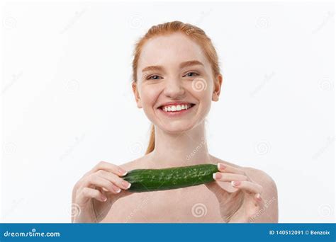 Cheerful Happy Beautiful Girl With Cucumber On Her Hand Isolated On White Stock Image Image