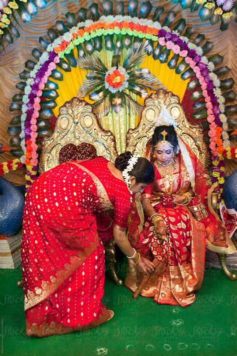 Indian Woman Adjusting Saree To Newly Married Bride By Dream Lover