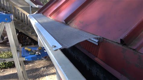 Easyon Gutterguard Installing On Standing Lock Metal Seam Roof Youtube