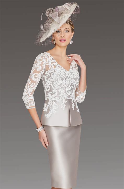 The Dress Has A Lace Top Bodice With 34 Sleeves And A V Neck Neckline
