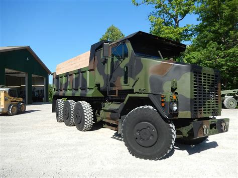 This 1994 M1070 Oshkosh Military Dump Truck Seats Six Can Haul 60