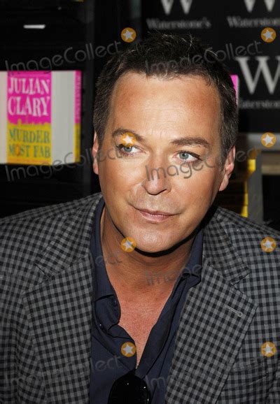 photos and pictures london uk julian clary signs copies of his debut novel `murder most fab
