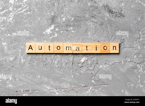 Automation Word Written On Wood Block Automation Text On Cement Table