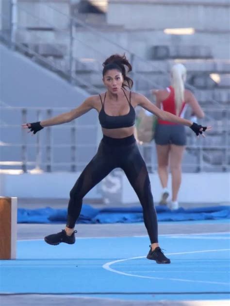 Nicole Scherzinger Shows Off Her Figure In Tight Lycra As She Works Up A Sweat For New Advert