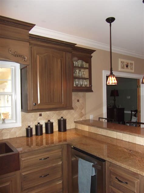 Maybe you would like to learn more about one of these? Old Oak Cabinets turned into New Bronze Cabinets ...