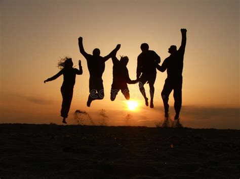Sunset Friends Jumping Stock Images Image 14260694