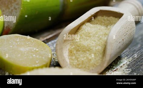 A Macro Shot Of A Composition Of Sugar Cane Cubes And Raw Granules