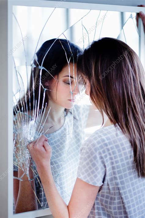 Woman In Front Of A Broken Mirror Stock Image C Science