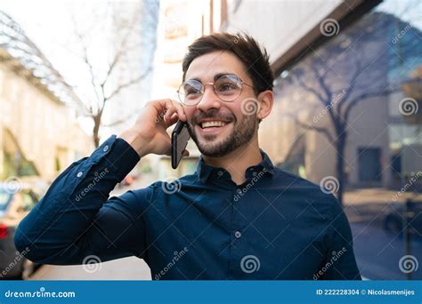 Young Man Talking On The Phone Outdoors Stock Photo Image Of Outside