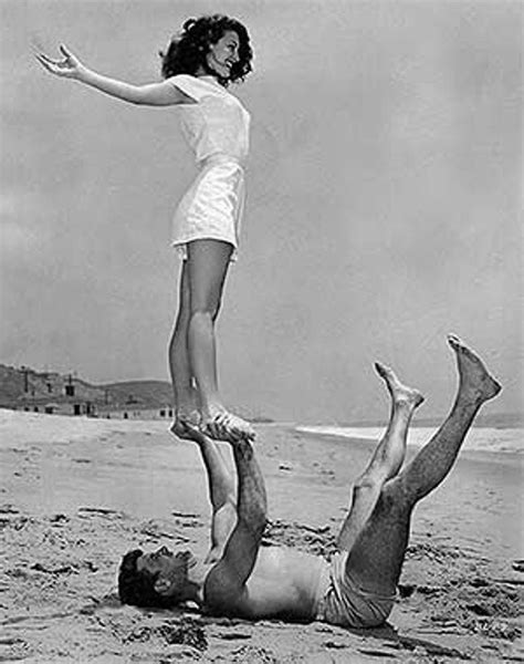 Ava Gardner And Burt Lancaster Enjoy Acro Yoga At The Beach 1946 Old Hollywood Hollywood Icons