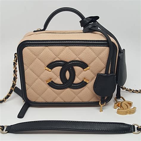 Chanel Cc Filigree Vanity Case Bag In Beigeblack Hebster Boutique
