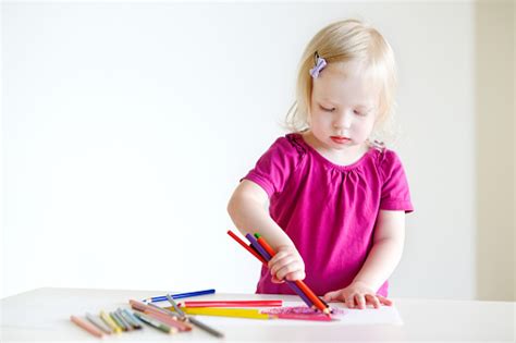 Check out our drawing toddler selection for the very best in unique or custom, handmade pieces from our shops. Cute Toddler Girl Drawing With Colorful Pencils Stock ...
