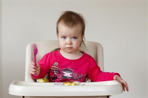 Pretty Baby Girl Eating Itself Healthy Food First Spoon Stock Photo