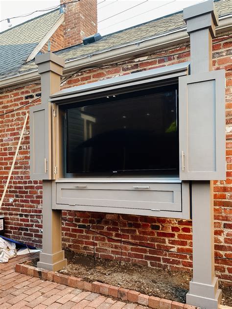 Our Outdoor Tv Enclosure Reveal Outdoor Tv Patio Outdoor Tv