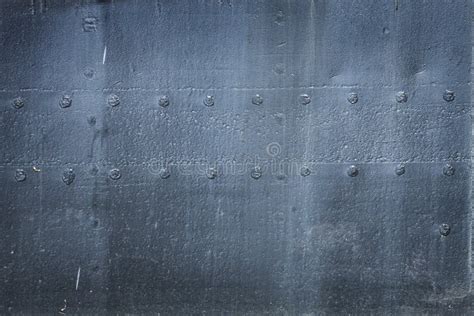 Metal Texture With Rivets From The Hull Of An Old Ship Stock Photo