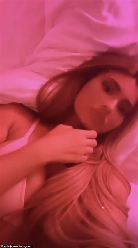 Kylie Jenner Sizzles In A Low Cut Nude Bra While In A Pink Lit Room As