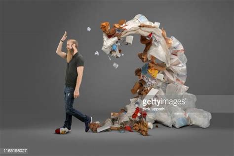 Man Throwing Garbage Photos And Premium High Res Pictures Getty Images