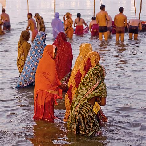 Hindu Women Bating In The Ganges River At Sangam Kumbh Mela