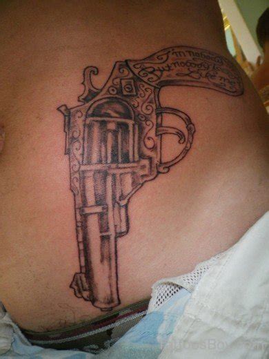 Grey Gun Tattoo On Waist Tattoo Designs Tattoo Pictures