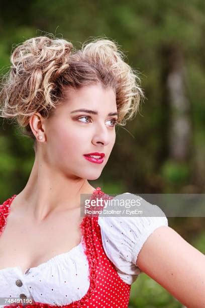 red dirndl photos and premium high res pictures getty images