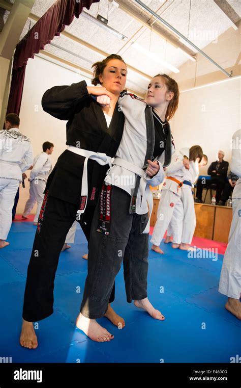 Two Young Women Girls Training In Self Defence At A Royce Gracie