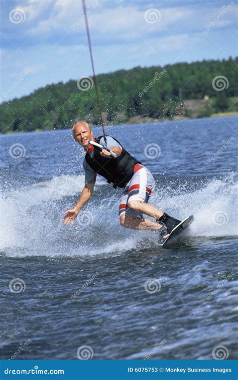 A Young Man Water Skiing Stock Photos Image 6075753