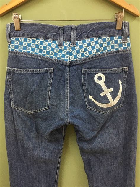 One Piece ONE PIECE - RELAXED FIT MONKEY D LUFFY PRINTED DENIM JEANS