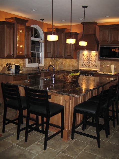 The kitchen island was originally introduced to add more countertop and storage space to a islands can have open shelving, oversized drawers, or simple cabinets. Custom kitchen with oversized island | Kitchen remodel