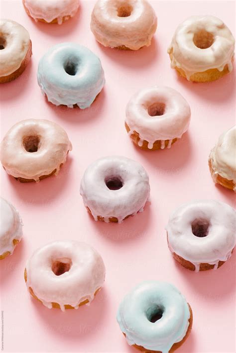 Pastel Colored Glazed Donuts On Pink By Stocksy Contributor Cwp Llc