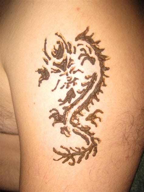 This tattoo, however, goes in the opposite direction and yet manages to not overdo it. 29 best Simple Dragon Henna Tattoo images on Pinterest ...