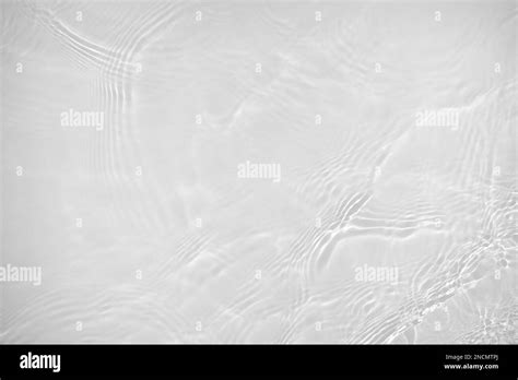 Desaturated Transparent Clear Calm Water Surface Texture Stock Photo