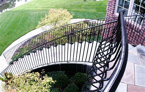 Outdoor Curved Staircase Wrought Iron Belly Rail Great Lakes Metal