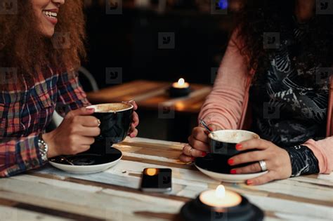 Friends Drinking Coffee At A Cafe Stock Photo 122521 Youworkforthem