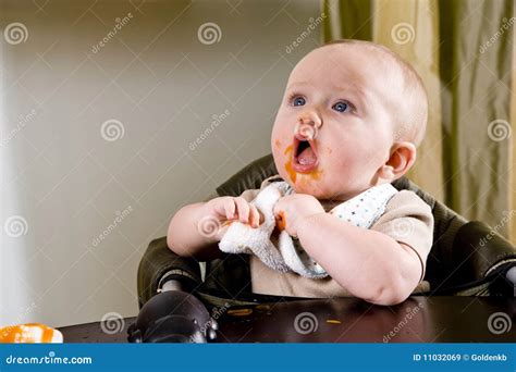 Cute Hungry Baby Eating Solid Food Royalty Free Stock Images Image