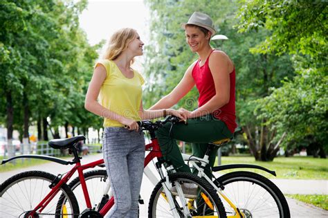 Young Couple Riding On A Bicycle Stock Image Image Of Leisure Healthy 89970351