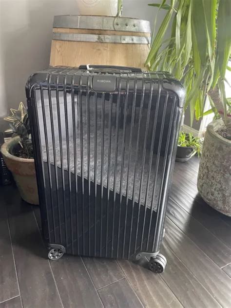 Rimowa Essential 292976 Check In Large 31 Inch Wheeled Suitcase Black