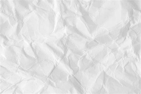 Белый мятый лист бумаги текстуры или фона Премиум Фото