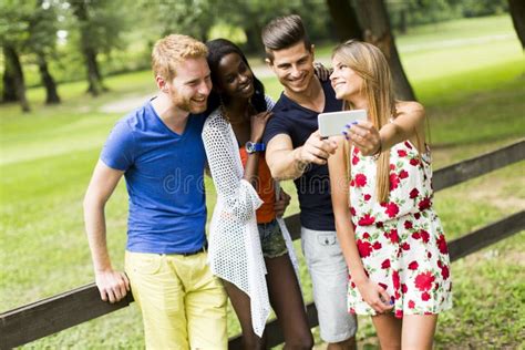 Young Multiracial Friends Taking Selfie In The Park Stock Image Image Of Leisure Friendship